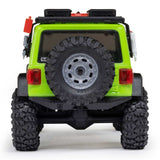Axial 1/30 scale SCX30 Jeep Wrangler JLU 4x4 brushed rock crawler on rugged terrain