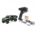 Axial SCX30 Toyota Tacoma TRD Pro 1/30 scale remote control rock crawler on rough terrain