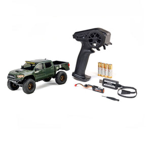 Axial SCX30 Toyota Tacoma TRD Pro 1/30 scale remote control rock crawler on rough terrain
