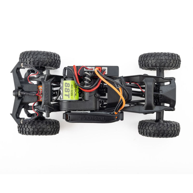 Axial SCX30 Toyota Tacoma TRD Pro 1/30 scale remote control rock crawler on rugged terrain
