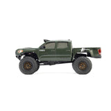 Axial SCX30 Toyota Tacoma TRD Pro 1/30 scale RTR rock crawler off-road vehicle on rugged terrain