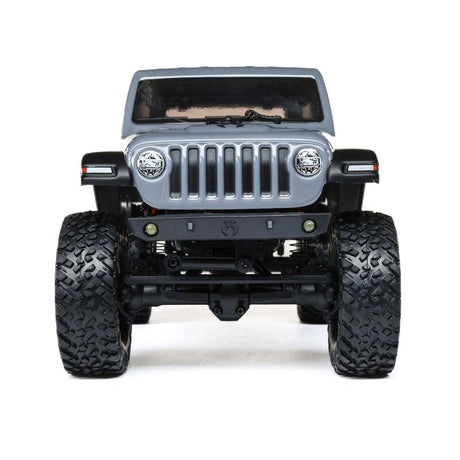 Axial 1/24 scale SCX24 2019 Jeep Wrangler JLU CRC 4X4 brushed rock crawler on rugged terrain