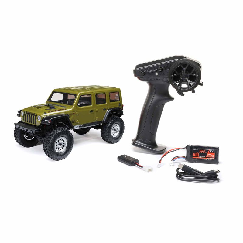Axial 1/24 scale SCX24 2019 Jeep Wrangler JLU CRC 4X4 brushed rock crawler on rugged terrain.