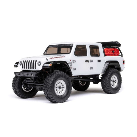 Axial 1/24 SCX24 Jeep JT Gladiator 4x4 RTR brushed rock crawler with detailed exterior and rugged off-road tires.