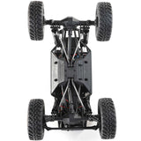Axial 1/18 scale Capra 4WD RTR trail buggy in black and green with detailed rugged design and off-road tires.
