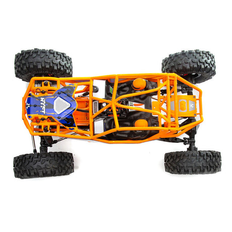 Axial 1/10 RBX10 Ryft 4X4 RTR brushless rock bouncer off-road RC vehicle on rugged terrain