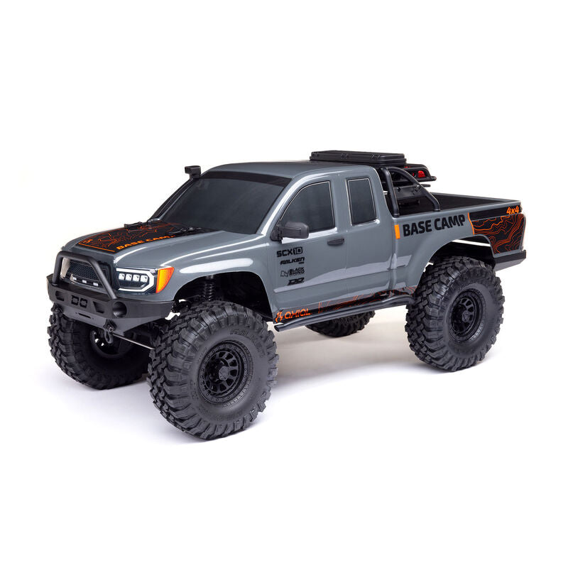 Axial 1/10 SCX10 III Base Camp 4x4 RTR brushed rock crawler in gray, showing off its rugged off-road design and detailed exterior.