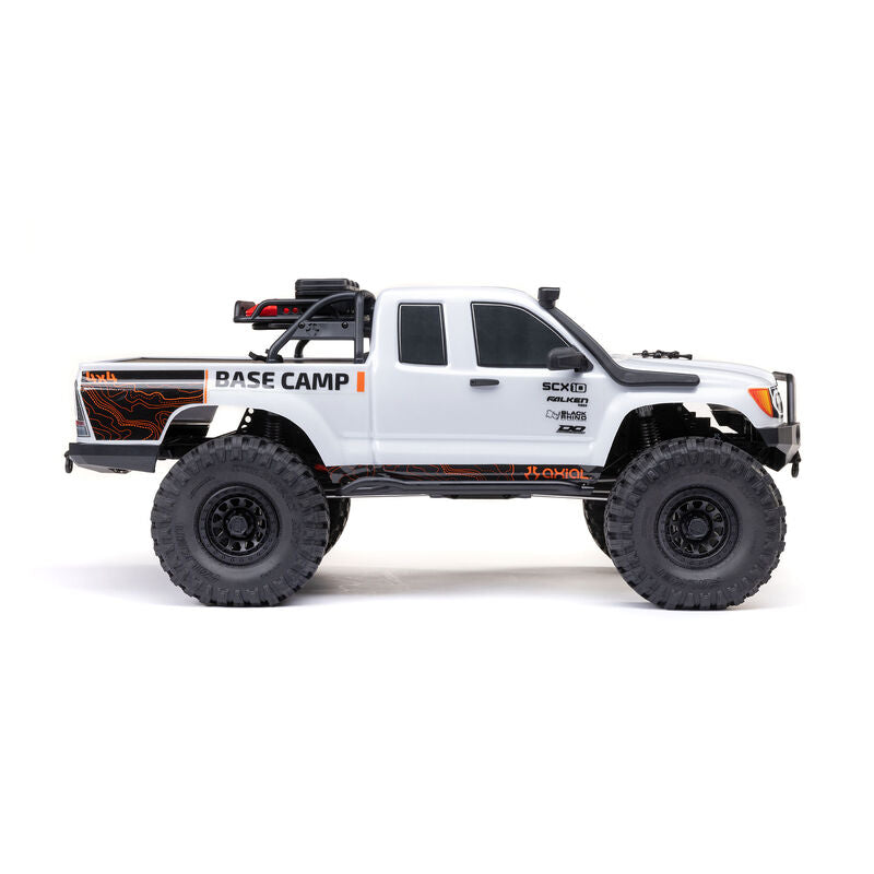 Axial 1/10 SCX10 III Base Camp 4x4 RTR brushed rock crawler in white, shown from side view with rugged off-road tires.