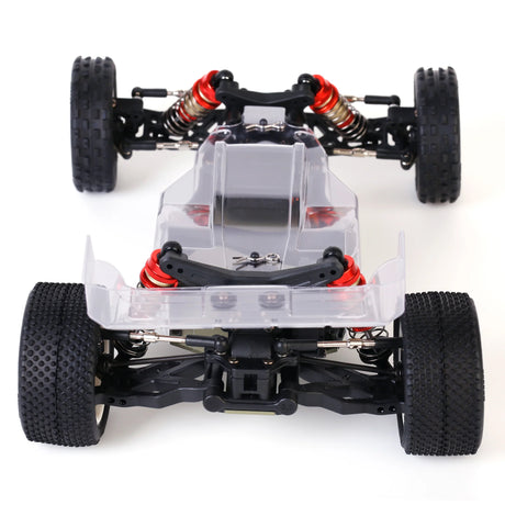 LC Racing BHC-1 1/14 scale 2WD buggy kit showing detailed chassis, suspension components, and racing tires.
