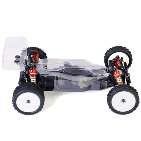 LC Racing BHC-1 1/14 2WD Buggy Kit with chassis, suspension, and components ready for assembly.