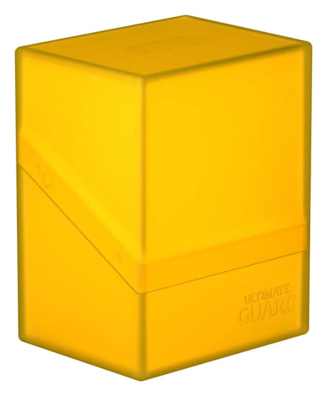 Yellow Ultimate Guard Boulder 80+ deck case for card storage, featuring a sturdy, compact design for trading card protection.