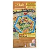 Catan Cities & Knights 5-6 Player Expansion 6th Edition by Catan Studio showing game box and components on a table.