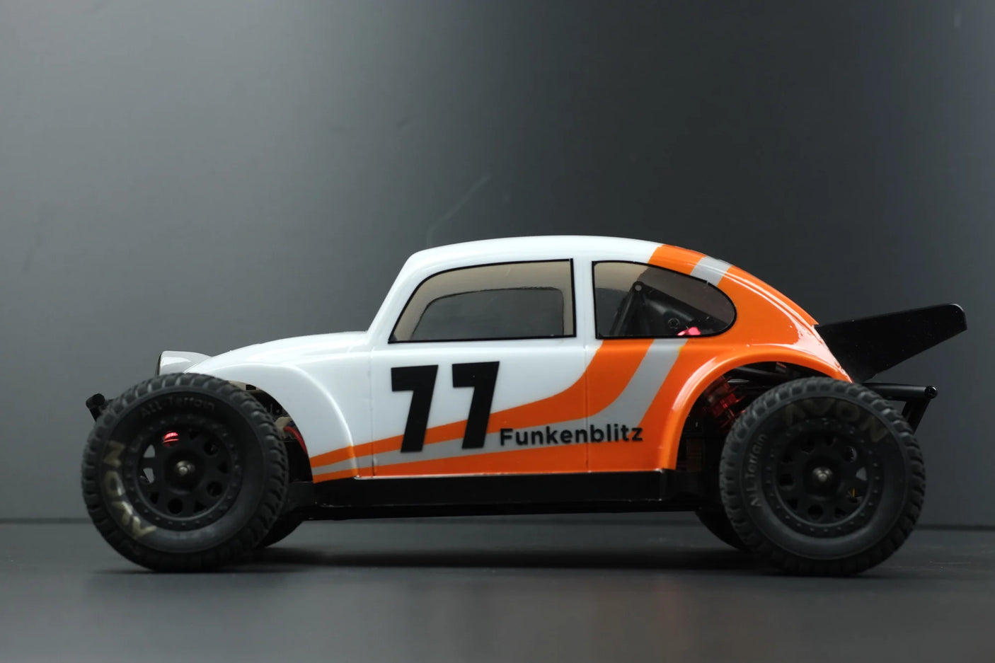 RC body by Phat Bodies for 1:14 and 1:12 chassis, featuring a sleek design with vibrant graphics for remote control cars.