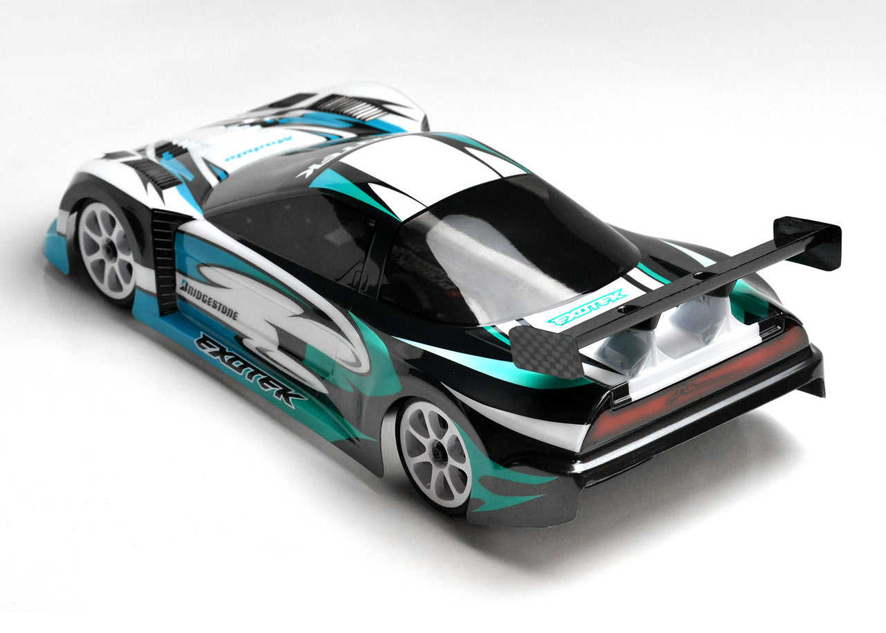 Exotek Racing Type-A 1/10 USGT RC car body in sleek design, shown on a racing chassis with detailed decals and aerodynamic features.
