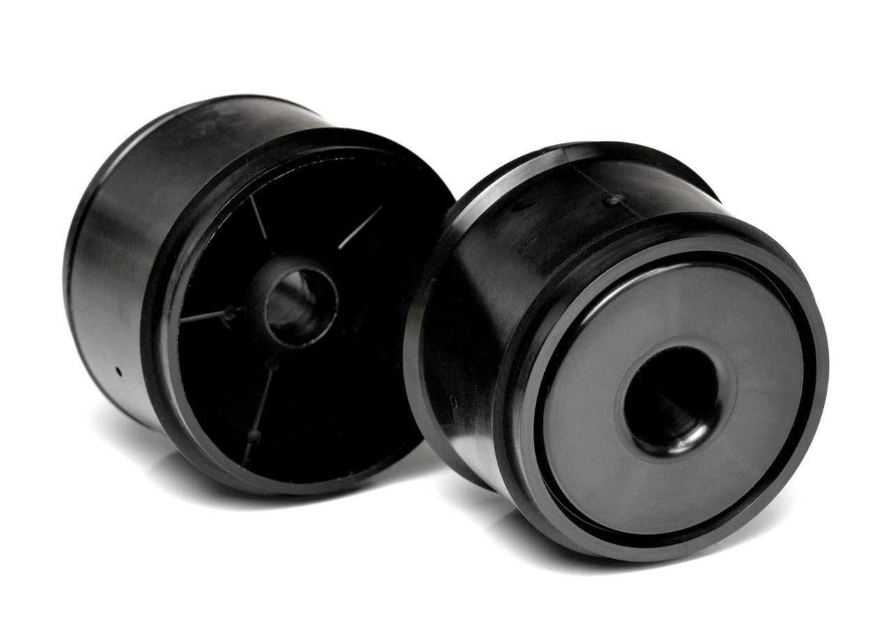 Pair of Exotek Racing F1 1/10 scale front disk wheels for RC car tires, shown on a remote control car.