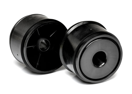 Pair of Exotek Racing F1 1/10 scale front disk wheels for RC car tires, shown on a remote control car.