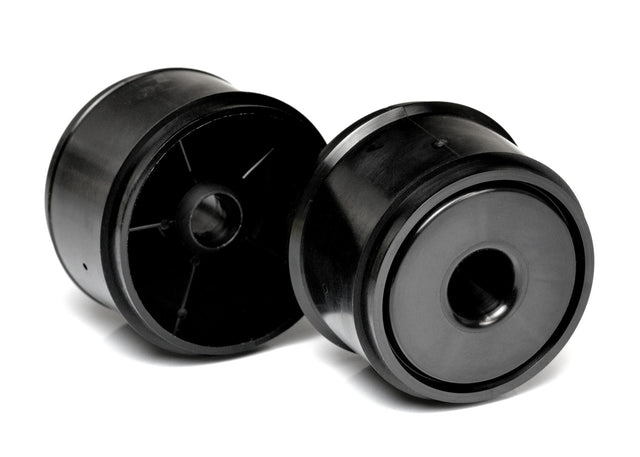 Pair of Exotek Racing F1 1/10 scale front disk wheels for RC car tires, shown on a remote control car.