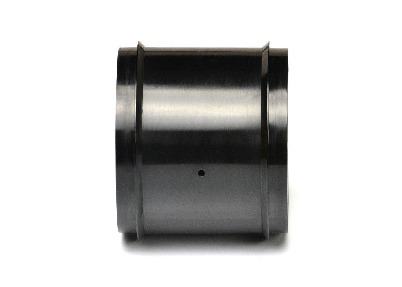 Exotek Racing F1 1/10 rear disk wheels for RC cars, pair of black rubber tires with detailed tread pattern.