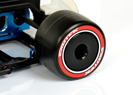 Exotek Racing F1 1/10 rear rubber tires, 28X, double red super soft for RC cars, shown mounted on wheel.