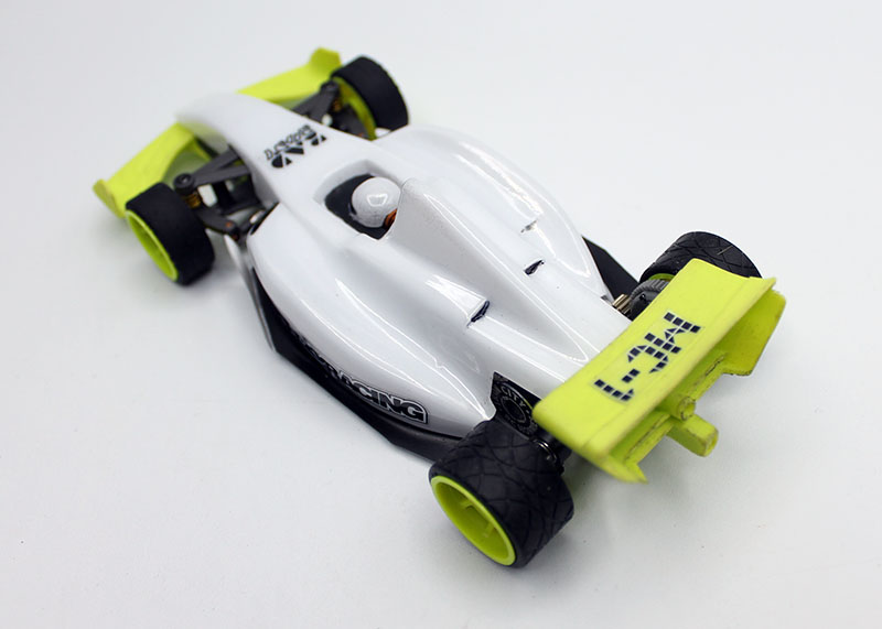 Reflex Racing FX28 Formula RC car kit with detailed body and wheels, designed for high-speed remote control racing enthusiasts.