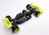 Red Reflex Racing FX28 Formula RC car kit with detailed body and racing decals on a smooth track surface.