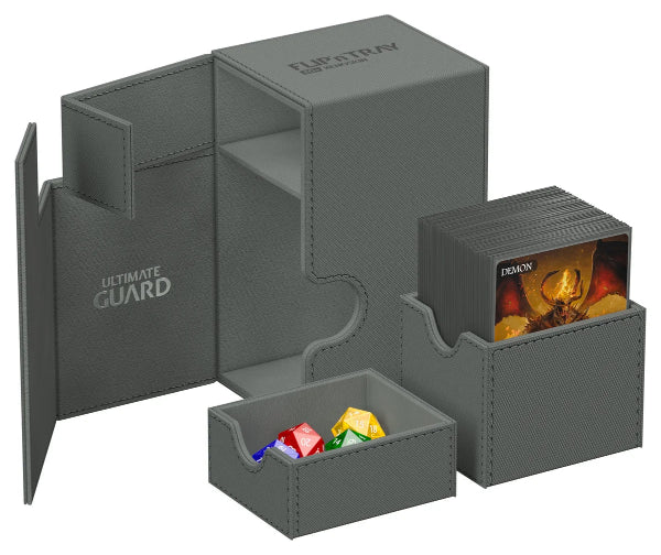 Ultimate Guard Flip'n'Tray 100+ Xenoskin card storage tray with grey exterior for organizing trading cards.