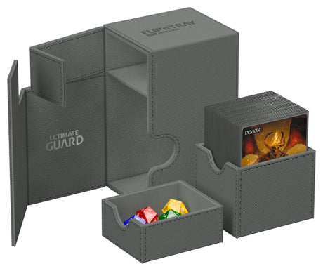 Ultimate Guard Flip'n'Tray 100+ Xenoskin card storage tray with grey exterior for organizing trading cards.