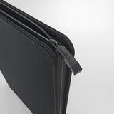 Black Gamegenic 24-pocket zip-up TCG binder with a sleek design, featuring a secure zipper closure and durable construction.