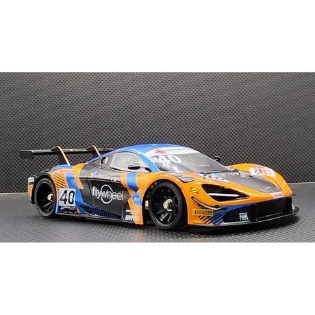GL Racing 1/28 McLaren 720S GT3 body flywheel, 102mm scale model showing detailed aerodynamic design and vibrant color scheme.