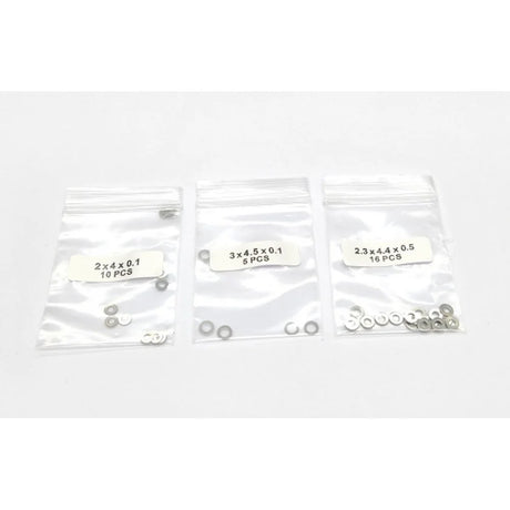 GL Racing GL-GTR Shim Set (GL-GTR-S-041) with multiple metal shims in packaging for engine tuning and maintenance.