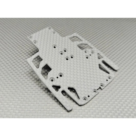 Wide carbon chassis for LMP2 race car by GL Racing, showing sleek aerodynamic design and lightweight construction.