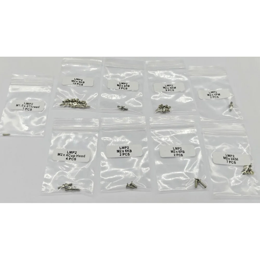 GL Racing LMP2 screw set with various fasteners, neatly arranged on a white background for automotive racing assembly.