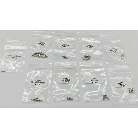GL Racing LMP2 screw set with various fasteners, neatly arranged on a white background for automotive racing assembly.