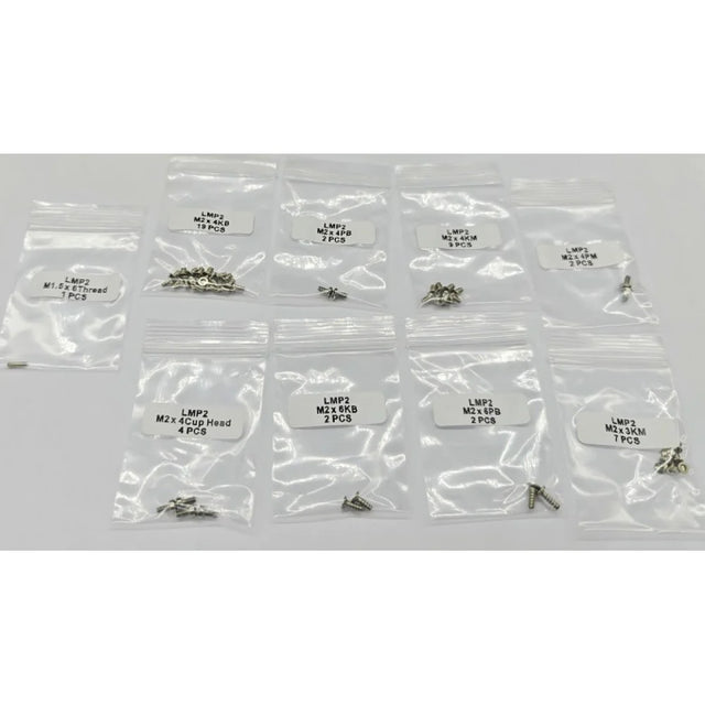 GL Racing LMP2 screw set with various fasteners, neatly arranged on a white background for automotive racing assembly.