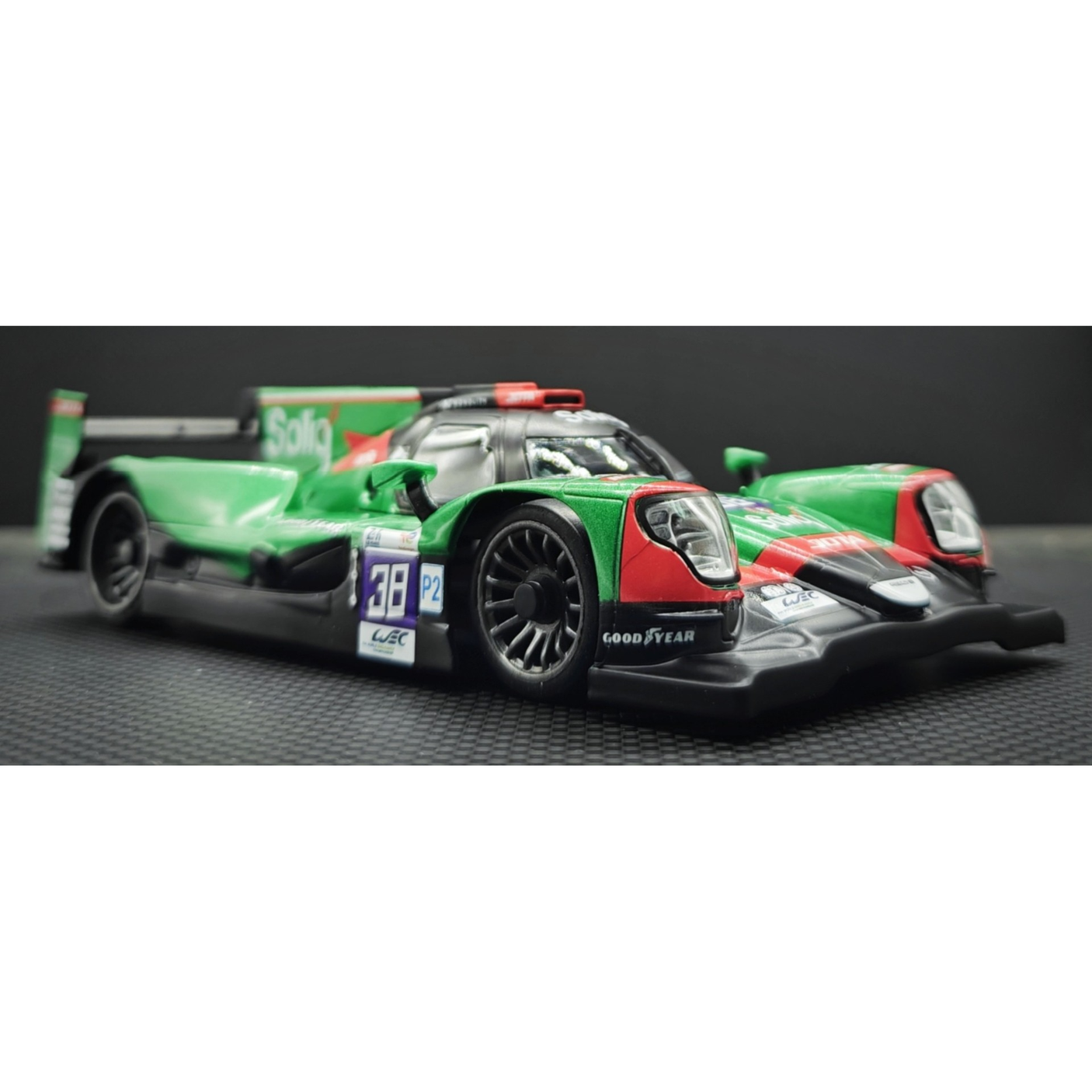 GL Racing 1/28 Soliq LMP2 model car body in 102mm scale, detailed black and silver racing chassis part.