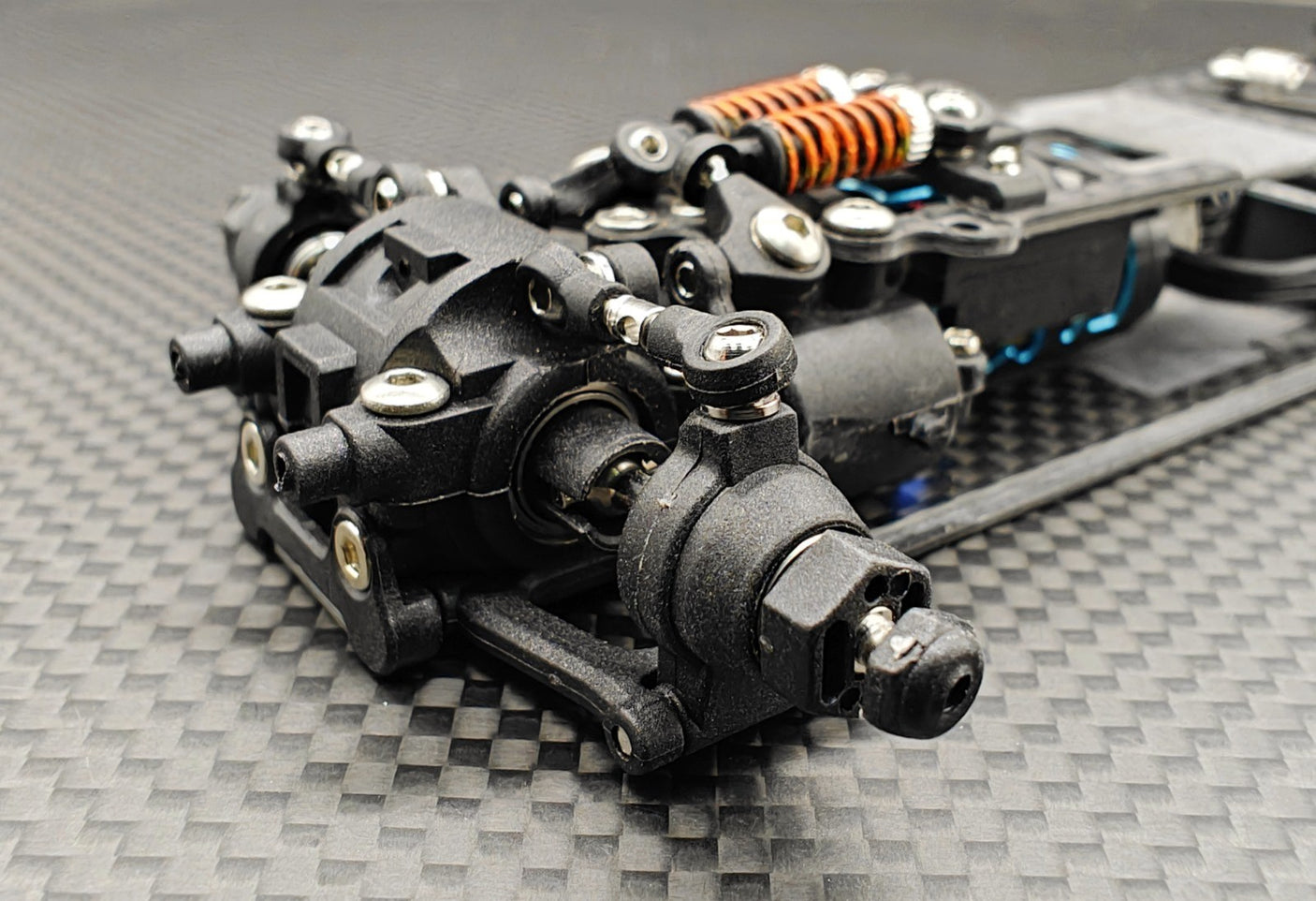 Front view of GL Racing 1/28 scale Formula One chassis, showcasing detailed racing car frame and construction.