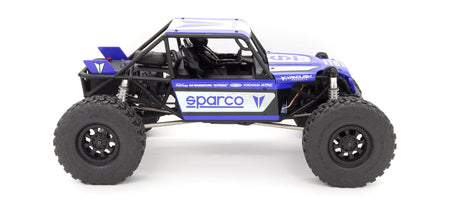 Vanquish H10 Optic RTR radio-controlled car with sleek design and detailed exterior, featuring Sparco branding and realistic features.