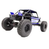 Vanquish H10 Optic RTR radio-controlled car with detailed blue and black body design, featuring aerodynamic styling and racing decals.