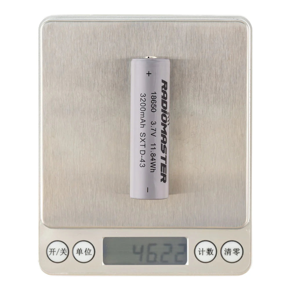 Two RadioMaster 18650 3200mAh 3.7V Li-ion batteries with silver metal casing and positive/negative terminals visible.