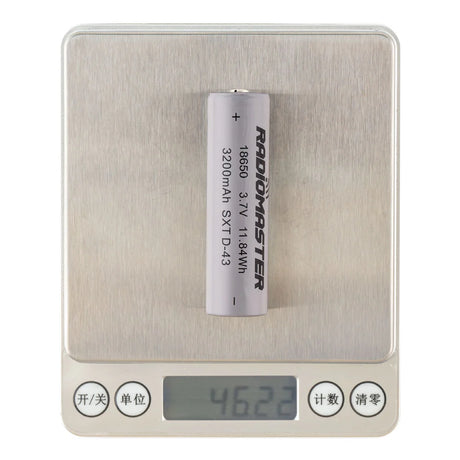 Two RadioMaster 18650 3200mAh 3.7V Li-ion batteries with silver metal casing and positive/negative terminals visible.