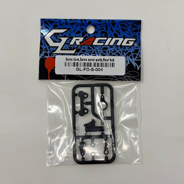 GL Racing Formula One servo horn, servo saver, and rear hub components for RC car, shown in the image.