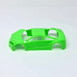 Jomurema GT01 car body in neon green, showing sleek aerodynamic design and vibrant color on a smooth surface.