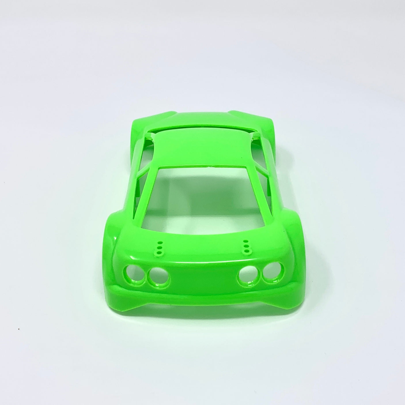 Neon green Jomurema GT01 car body showcasing sleek aerodynamic design and vibrant color for racing or sport vehicles.