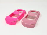 Jomurema GT01 car body set in vibrant neon pink with a sleek, aerodynamic design, perfect for customizing sports cars.