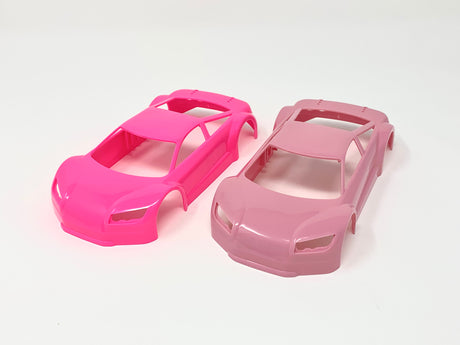Jomurema GT01 car body set in vibrant neon pink with a sleek, aerodynamic design, perfect for customizing sports cars.
