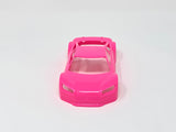Jomurema GT01 car body set in vibrant neon pink, featuring detailed aerodynamic design for custom vehicle modifications.