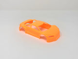 Jomurema GT01 car body in vibrant neon orange, showcasing sleek aerodynamic design and detailed finish.