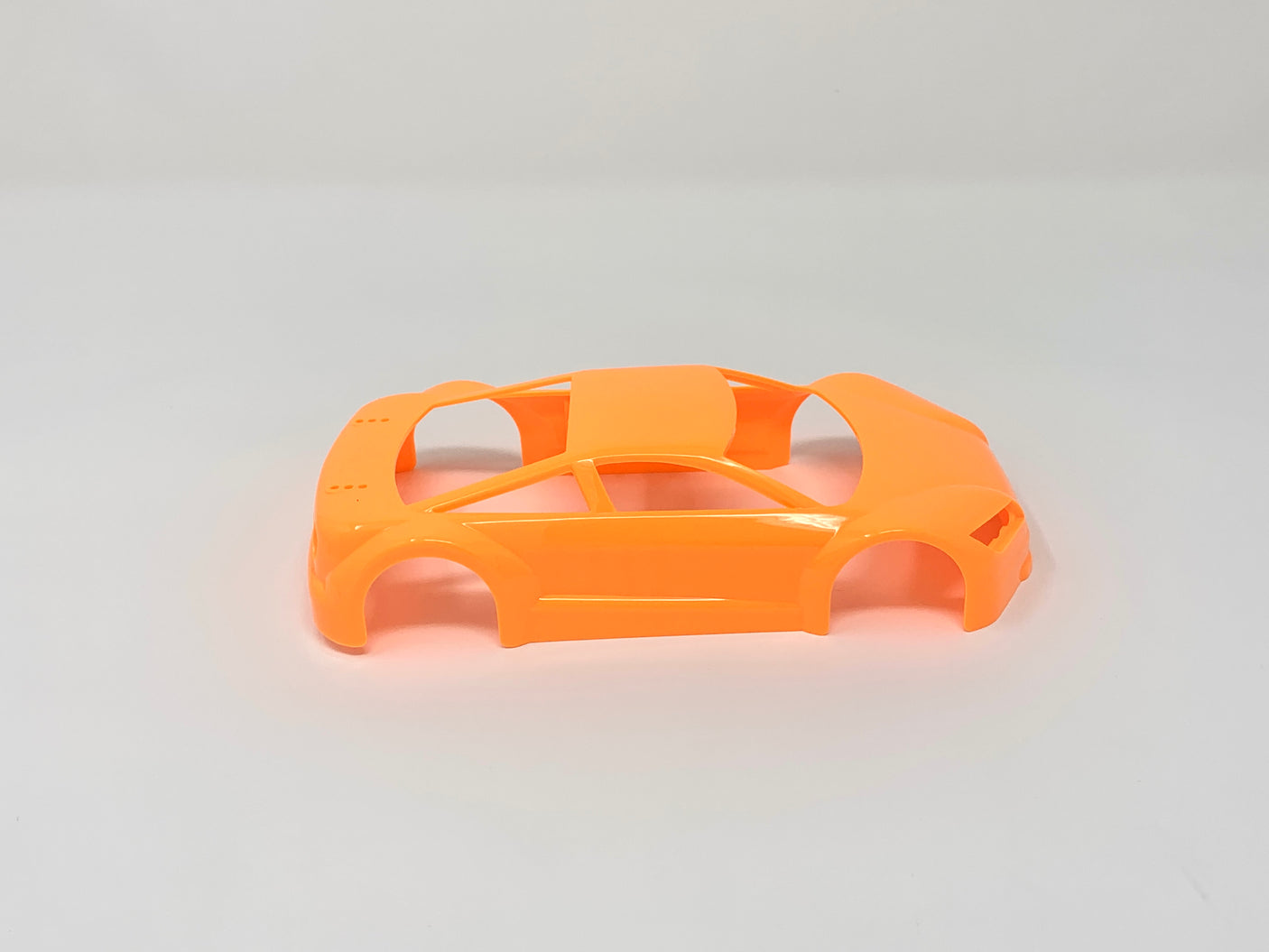 Jomurema GT01 car body in vibrant neon orange, designed for sporty vehicle customization and style.