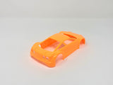 Jomurema GT01 car body in vibrant neon orange, designed for sporty vehicles with sleek aerodynamic features.