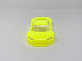 Neon yellow Jomurema GT01 car body kit on a vehicle, showcasing its sleek design and vibrant color for automotive customization.